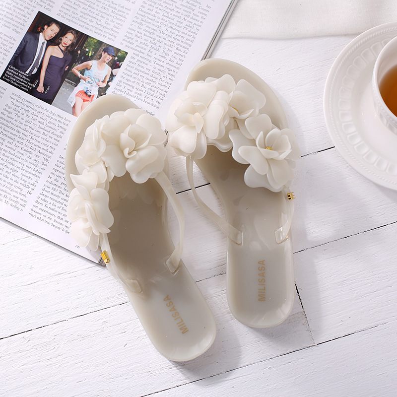 Nieuwe Zomer Camellia Slippers Platte Bodem Jelly Dames Antislip Kleine Geur Bloem Strand Sandalen